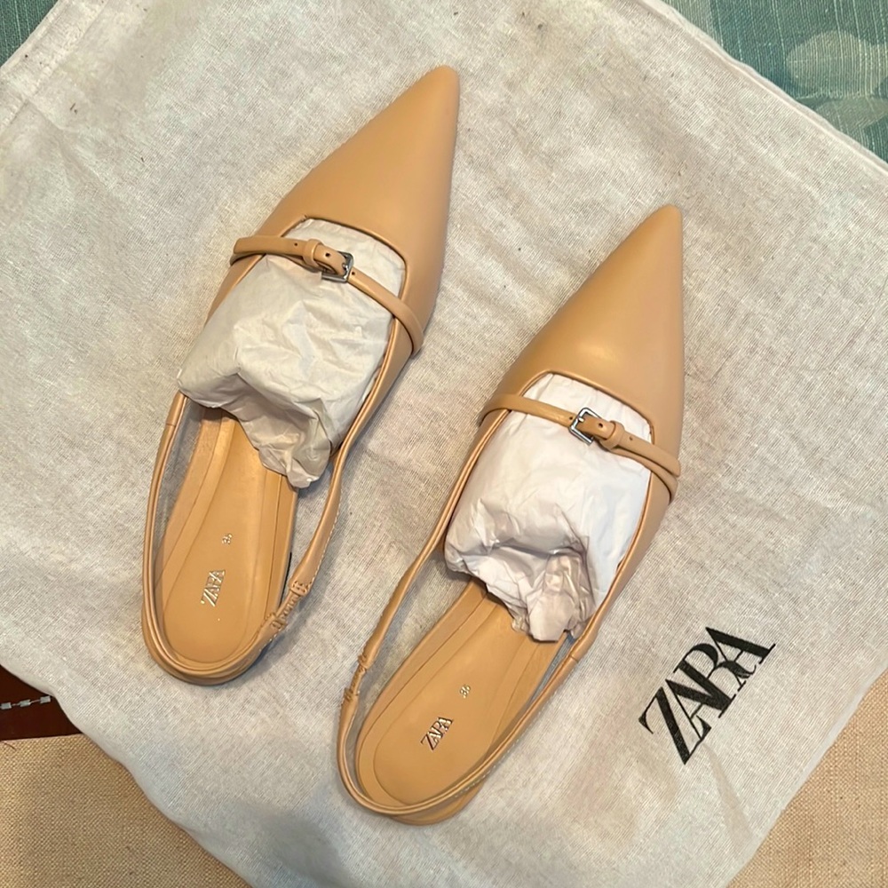 Brand new slingback flats. Size 5
